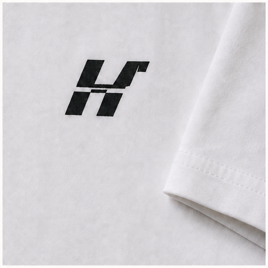 Signature Tee — H mark and sleeve finish